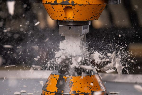 A piece of ceramic exploding under pressure