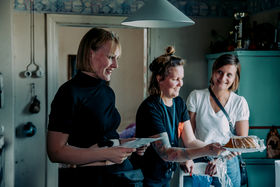 three women on film set