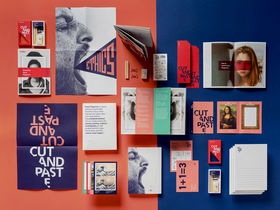 Overhead photo of the works including notebooks, posters, postcards