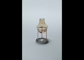 a heat oil diffuser made of glass, copper and concrete