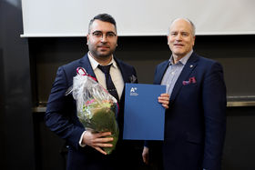 Julkaisupalkinnon saaja Yuri Kroyan ja Gary Marquis