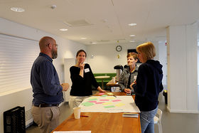 Erasmus+ Staff Training 2023, four participants in a small group discussion.