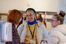 Three women discussing with each other