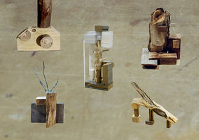 Five different 3D collage like sculptures made of wood