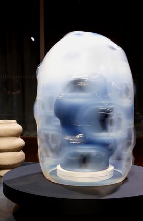 Spinning, blurry glass sculpture