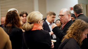 Happy people gathering together after Radical Creatives premier in the US