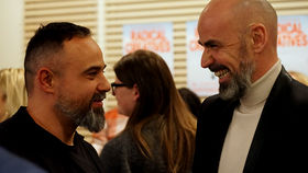 Happy people gathering together after Radical Creatives premier in the US