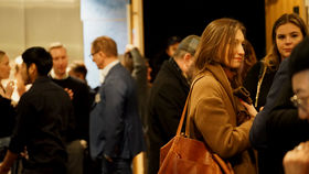 Happy people gathering together after Radical Creatives premier in the US