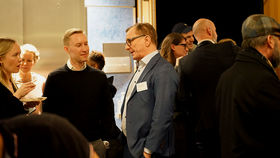 Happy people gathering together after Radical Creatives premier in the US