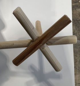 Star shaped joint made of round timber pieces