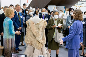 Student presents the costume to the group. 