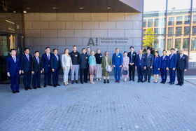Guests and Aalto personnel in a group photo.