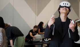 A student trying out a VR headset.