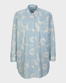 Light blue long-sleeve shirt with large white floral pattern and a chest pocket.