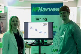 Two startup members at Demo Day 2025