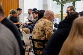 Attendees networking at Innovation Week event