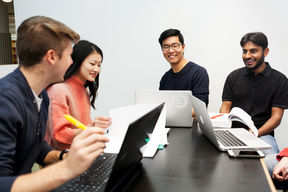 A photo of Aalto University students discussing, photo by Aino Huovio