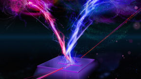 Red and blue light bursting out of a metallic box