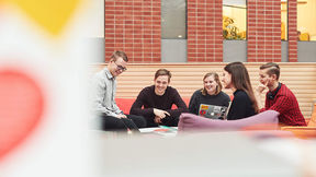 Photo showing a group of students working together