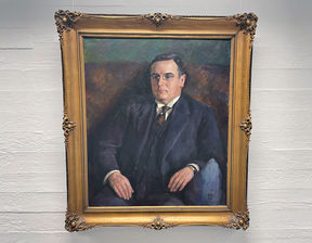 Kuvassa näkyy Einar A. Haapalan muotokuva, jonka on maalannut taiteilija Emil Danielsson.  