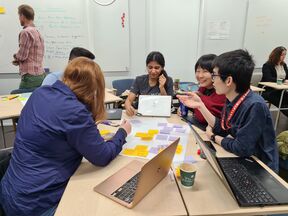 Design Methods class smiling faces during group work. Photo: Ayse Pekdiker