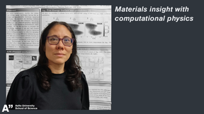 photo of woman standing in front of scientific poster