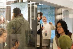 People in a social setting, chatting