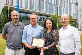 Ewald Kibler and Anastasia Koptsyukh in the middle