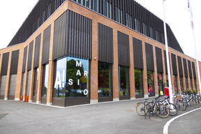 Marsio building seen from the outside, Marsio text and Aalto logo in the window