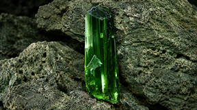 Scanning electron microscope image of a vivianite crystal in wastewater (edited by AI)
