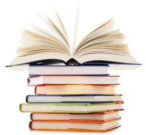 An open book standing on a tall stack of colourful closed books on a white background