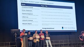 Winners on stage for the EAA best student paper award