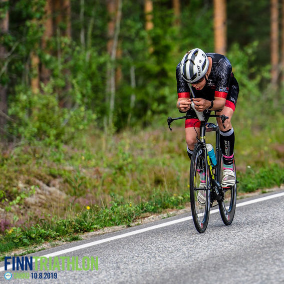 Dr Antti snicker on a triathatlon bike in the finnish countryside