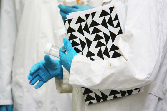 Labcoat and notebook