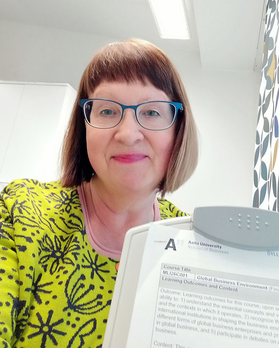 Program Director Joan Lofgren with GBE course syllabus