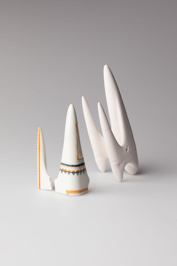 ceramic sculptures representing futuristic vehicles