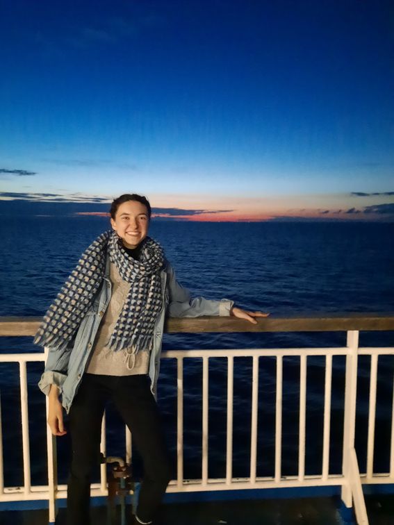 Flavie Ailhaud on a boat. 