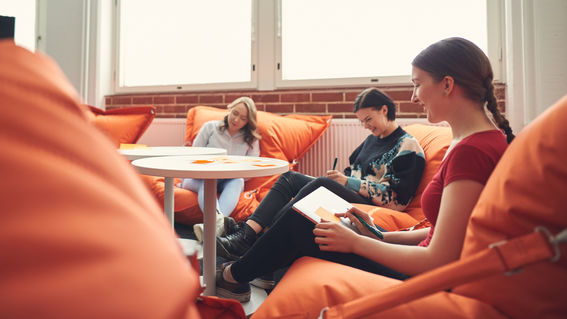 Three students sitting together