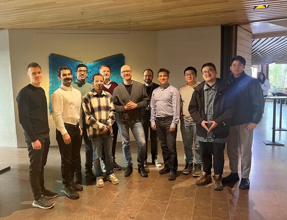 Group of doctoral students and their supervising professors.