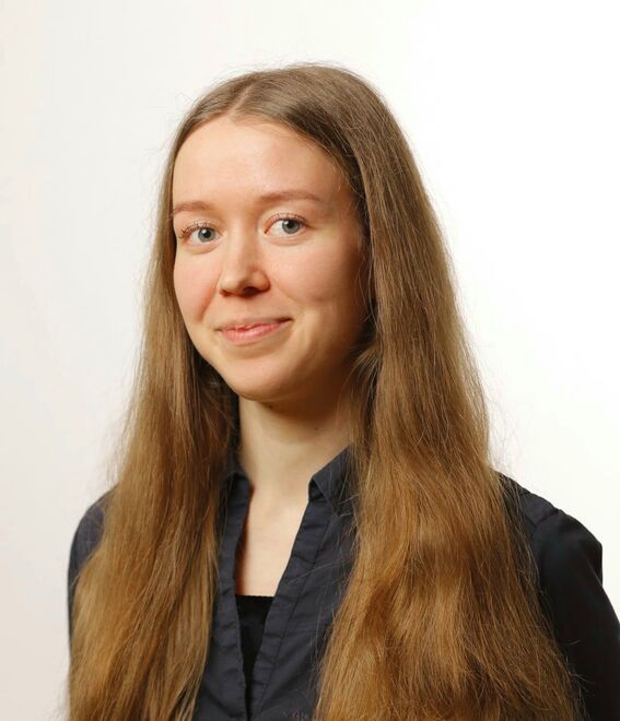 Mery wearing a dark shirt