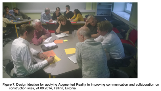 Group of people working in a design workshop.