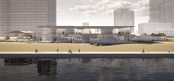 Modern waterfront building with large windows, surrounded by skyscrapers. People walking and cycling along the shore.