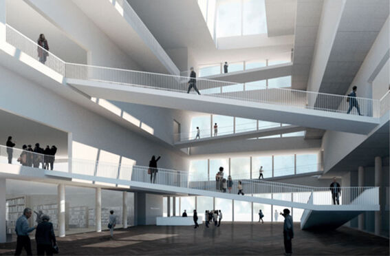 Modern building interior with multiple floors, large windows, and people walking on ramps.