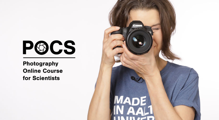 Photography trainer Tiina Puputti with a camera.