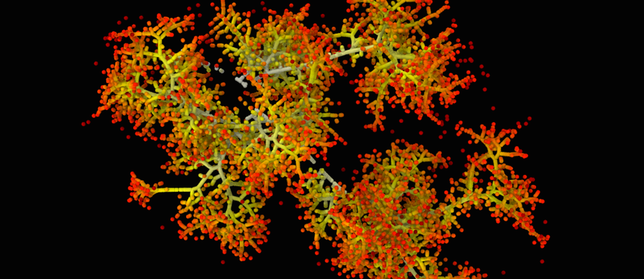 Atomic model with red, orange and yellow blobs