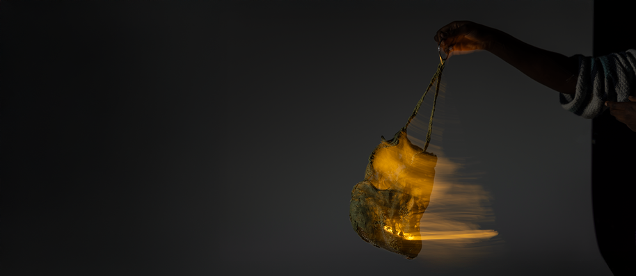 Swinging algae papier-mâché lantern