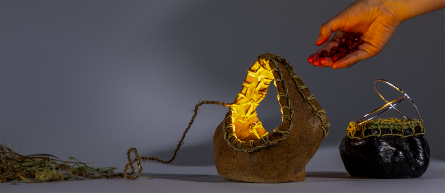 Seaweed lantern vessels. As the user gathers material from the forest and
sea, the light is gradually obscured, indicating suﬃciency. In the winter
months, the forms act as a catch-all for mending needles and fibers