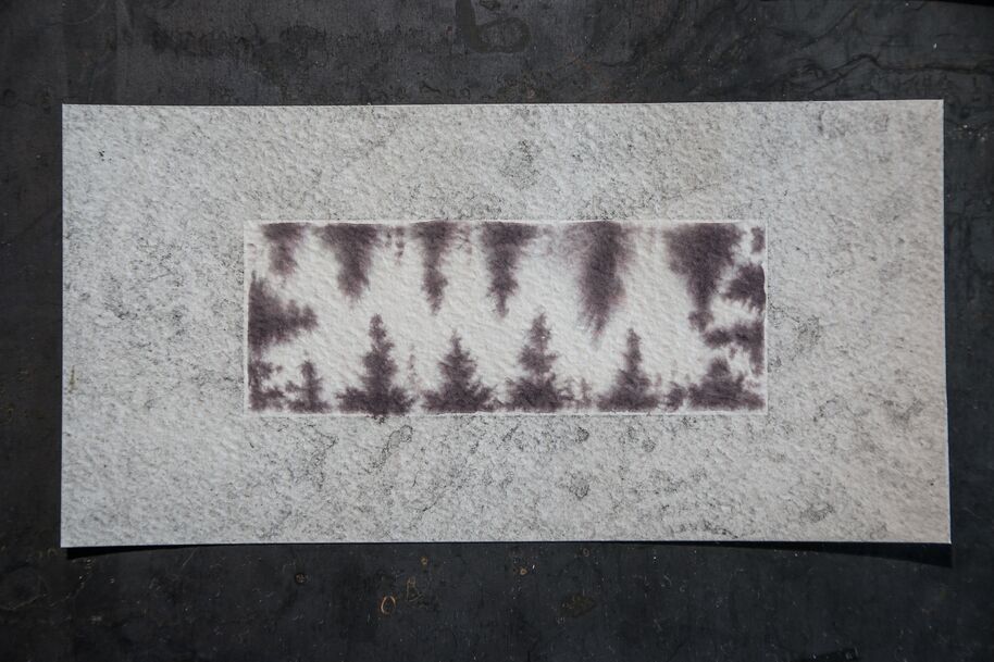 Abstract grey painting on textured paper, central strip shows blurry tree-like shapes in dark purple.