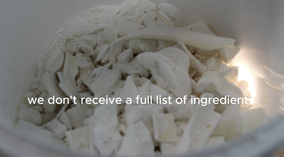 White chunks and powder in a bowl with text: we don't receive a full list of ingredients