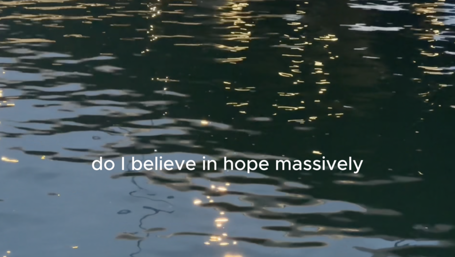 Text over dark blue water with golden reflections reads: do I believe in hope massively